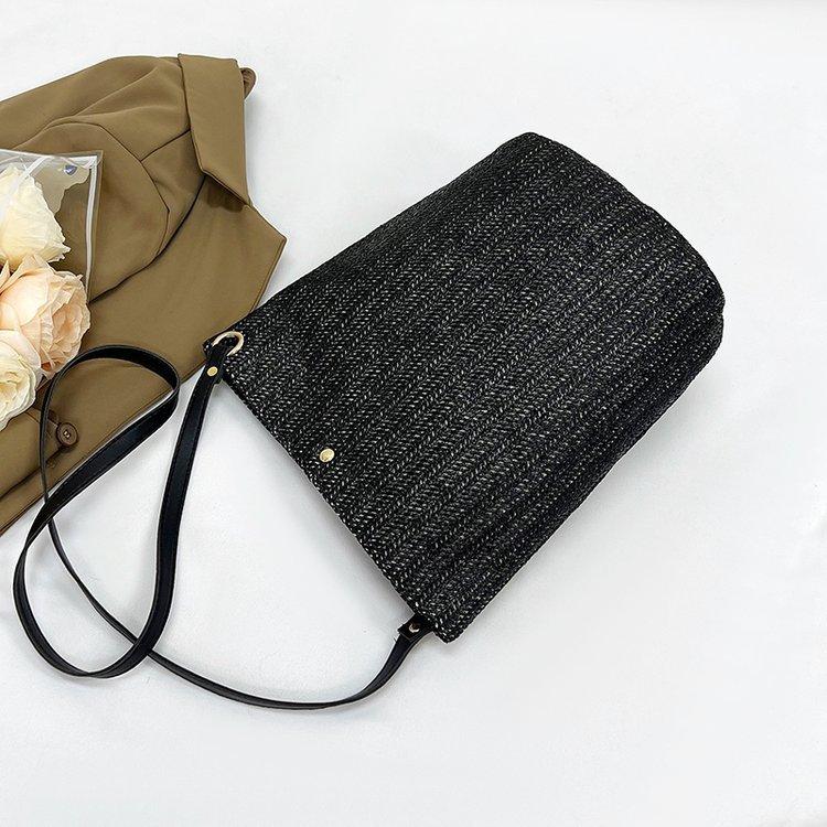 编织包女包新款潮2024夏草编简约百搭小清新水桶包个性单肩斜