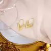 Pendientes Metálicos de Moda Creativa Estilo Ins Calados Corazón Estéreo Forma Geométrica Pétalos Estrella de Cinco Puntas Pendientes de Estilo Simple para Mujer