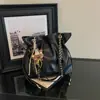 Bolsa Feminina 2026 Outono Novo Modelo Uso Diário Deslocamento Cor Sólida Simples Nicho Estiloso Grande Capacidade Bolsa de Ombro com Corrente