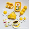 Accesorios de resina DIY pan amarillo para jugar huevo taza de leche teléfono móvil decoración de belleza pegatina de refrigerador material de caja sorpresa