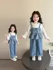 Conjunto elegante y chic de pantalones vaqueros de pierna ancha para niñas, primavera y otoño, nueva versión coreana 2026, conjunto dulce de tres piezas para niños pequeños