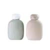 Material de Felpa Suave Botella Rellenable de Tapa abatible de 100 ml Botella para Loción Champú Gel de Ducha Detergente para Ropa Botella de Plástico Tamaño de Prueba