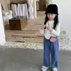 Camisetas de manga larga para niñas de primavera y otoño, camisetas básicas versátiles de color liso estilo coreano, elegantes y a la moda, para bebés y niños, al por mayor