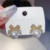Pendientes Coreanos de Nuevo Estilo con Lazo y Perla para Mujer, Pendientes de Botón Brillantes con Pedrería de Lujo Ligero de Nicho