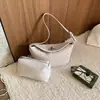 Padrão trançado japonês e coreano simples e elegante 2026 bolsa de ombro transversal feminina de verão de pequena capacidade para o dia a dia mãe-filha