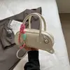 Bolso de Mano Pequeño Cuadrado Texturizado Color Sólido Casual Japonés Estilo Coreano para Mujer Modelo Nuevo Verano 2026 Bolso de Hombro Único Cruzado