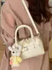 Bolsa de mano bandolera de alta gama, elegante, sencilla, estilo nuevo, primavera 2026, transfronteriza, bolso de moda y elegante para mujer