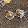 Pendientes de perla gris con diamantes brillantes 2024, nuevos pendientes de nicho únicos y explosivos para mujer, elegantes y de alta gama.