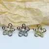 Botón de Flor Calado Estilo Coreano Perla Flor de Cinco Pétalos Botón Metálico Vestido Cortavientos DIY Anillo para el Cabello Hebilla Decorativa