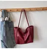 Bolso de mujer de gran capacidad, versátil para otoño, nuevo diseño de moda 2026, bolso de hombro simple, bolso tote texturizado para la escuela y el trabajo