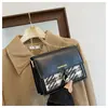 Bolso Cuadros de Color Contrastante para Mujer 2024 Primavera y Verano Nuevo Estilo Cinta de Aspecto Elegante Bolso Cuadrado Pequeño Ins de un Hombro Cruzado