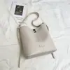 Bolsa de Ombro Grande Capacidade Retrô Feminina 2026 Nova Bolsa Balde Simples Alta Aparência Ombro Único Transversal Bolsa para o Dia a Dia