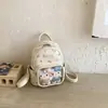 Mochila de Moda Fresca Elegante de Dibujos Animados 2026 para Mujeres, Bolso de Mano Pequeño Versátil Texturizado de Diseño de Nicho