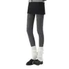 Los leggings de algodón de rayas verticales se pueden procesar en pantimedias de algodón de rayas verticales con lunares gris ahumado y flocado para que las mujeres los usen afuera más
