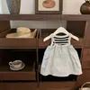 Verano Nuevo 2026 Moda Dulce Fresco Chaleco Rayado Elegante Secado Rápido Ropa de Trabajo Conjunto de Falda con Tirantes para Bebés