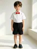 Pantalones cortos negros lisos para niños, pantalones cortos de verano versátiles para niños, nueva ropa casual de verano para niños, al por mayor