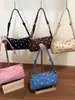 Bolsa de Design de Nicho Transfronteiriça com Bolinhas Simples 2026 Verão Nova Moda Versátil Estilosa Personalidade Bolsa Cilindro de Axila