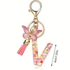 Llavero de moda con letras rosas, lentejuelas de amor, borla de mariposa, llavero, accesorios de colgante de epoxi de cristal para damas