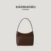 Bolso tote tejido de PU retro, versátil para ir al trabajo, casual y a la moda, bolso de hombro para mujer de nuevo estilo, diseño único