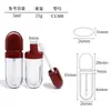 Brillo de Labios Personalizado OEM de 5 ml con Aplicador de Pincel Pequeño Tubo de Brillo de Labios Tubo Largo Rojo Marrón Tubo Ovalado de Brillo de Labios