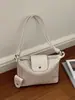 Bolso tejido con patrón transfronterizo para mujer, nuevo bolso tipo cubo de gran capacidad, bolso de hombro versátil y moderno para llevar debajo del brazo