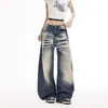 Calça jeans larga de cor laranja jovem # com design desgastado inspirado em vintage, corte solto, efeito emagrecedor, estilo único, versátil e moderna
