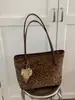 2026 nuevo bolso de hombro tipo tote de gran capacidad, alta calidad, nicho, con estampado de leopardo patchwork de textura mate