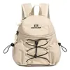 Mochila pequeña impermeable ligera estilo japonés para comercio exterior transfronterizo, deportes, modelo nuevo 2026, mochila para mujer para viajes al aire libre y ocio