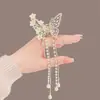 Pasador de Metal Mariposa Transfronterizo, Colgante de Borla para Cabello a Medio Recoger Femenino y de Alta Gama 2024 Clip para la Parte Posterior de la Cabeza del Festival de los Faroles