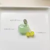 Precio mayorista directo de fábrica pulsera hecha a mano pulsera con colgante diy accesorios pequeños deslizantes colgante de garra de gato lindo Joker