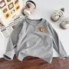 Nueva camiseta base de otoño para niños, camiseta de manga larga De Jong de color liso clase A, top elegante y versátil para bebés, venta al por mayor