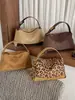 Bolsa casual de nicho para mulheres, novidade outono de 2026, bolsa transversal vintage de cor sólida, bolsa de ombro e de axila personalizada para o dia a dia