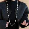 Nuevo collar de perlas artificiales de doble capa apiladas, exquisita cadena de clavícula de moda transfronteriza, elegante cadena de lana ligera de lujo francesa