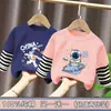 Camiseta de manga larga a rayas de algodón puro para niño, estilo dos piezas falsas, ropa de otoño, nuevo modelo primavera y otoño 2026, camiseta básica para niño pequeño