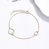 Pulsera de doble anillo de circonita para mujer, joyería de plata 925, diseño de nicho, accesorio de mano de lujo ligero transfronterizo ins de alta gama, regalo de cumpleaños