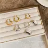 Pendientes de aro pintados en spray con aguja de plata, lujo ligero, de alta gama, modernos y exquisitos, diseño único, accesorios para orejas versátiles y de nicho
