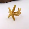 Anillo Abierto Ajustable de Acero Inoxidable con Forma de Estrella de Mar y Concha Serie Oceánica Anillo de Acero Inoxidable Pendientes