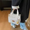 Bolsa de almuerzo portátil de moda Transfronteriza Nueva Bolso de mano casual para viajes Versión coreana para mujer Bolso de lona versátil y moderno
