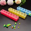 Caja de pastillas mini creativa de 7 compartimentos de plástico sub-empaque pastillas siete días a la semana pastillas para el cuidado de la salud caja de almacenamiento portátil caja de medicamentos