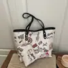 Bolsa de Ombro Única Tote Fashion Versátil de Alto Valor com Estampa de Desenho Animado Fofo Nova para a Primavera de 2026