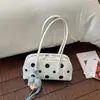 Bolsa de ombro de design de nicho transfronteiriço 2026 nova poá retrô versátil bolsa de mão simples para o dia a dia bolsa bowling