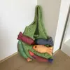 Bolsa de Tricô Criativa de Nicho para Pedidos Estrangeiros para Mulheres Verão 2025 Nova Bolsa de Ombro Versátil Bolsa Tote de Desenho Animado para o Dia a Dia