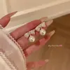 Pendientes de Lazos Microincrustados de Circonita de Venta Caliente Estilo Coreano 2026 para Mujer, Aguja de Plata S925, Pendientes de Perla de Botón de Gama Alta Nicho