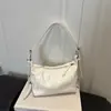 Otoño 2026 Nuevo Artículo Gran Capacidad Alta Calidad Elegante Nicho Moda Simple Versátil Alto Valor Bolso de Hombro Único Cruzado