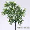 Venta al por mayor del fabricante Árbol Artificial Creativo Rama Única Planta de Tuya Decoración Agujas de Pino Planta Verde Pared Decoración Suave Ramas