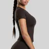 Versátil camiseta básica de yoga de manga corta y cuello redondo para mujer, una camiseta deportiva adelgazante, de secado rápido y transpirable