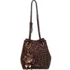 Nueva moda 2026: Bolso cubo estilo coreano con estampado de leopardo para mujer, lujo ligero, elegante y minimalista, adecuado para otoño, se puede llevar en la mano o cruzado.