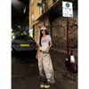 Estilo Americano Impresión Digital 3D Diseño Degradado Salpicaduras Cuchillo Curvo Jeans para Hombres y Mujeres Pierna Ancha Holgada Pantalones Sucios Pantalones Largos