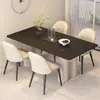 Mesa de comedor rectangular minimalista y juego de sillas, adecuado para apartamentos pequeños, moderno, simple y lujoso, una opción popular para el comedor del hogar