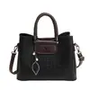 Bolsa Feminina Lisa Simples e Estilosa 2026 Novo Modelo Bolsa de Ombro em Couro PU Bolsa Transversal para Mamãe Bolsa Tote de Grande Capacidade